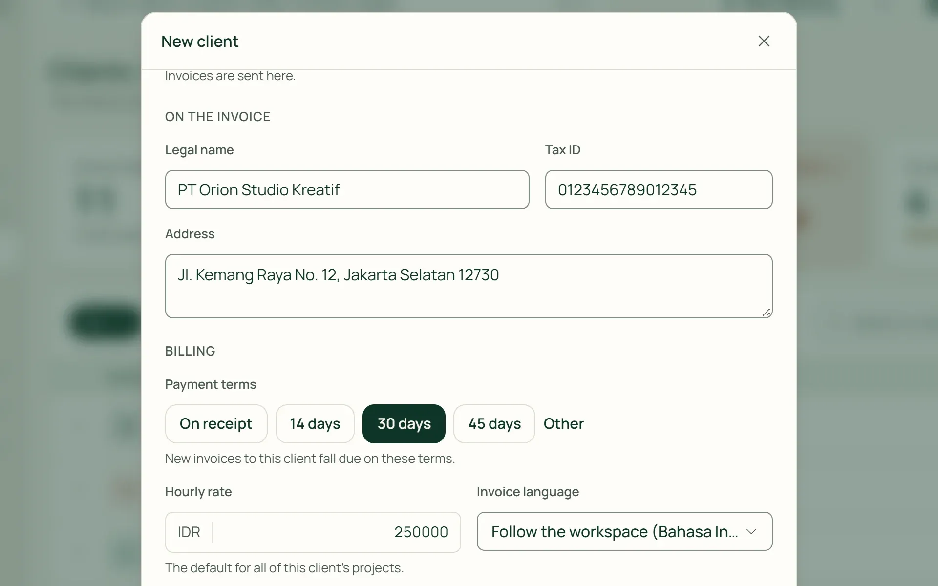 The new client form in Tumra with tax ID, payment terms, hourly rate, and invoice language.